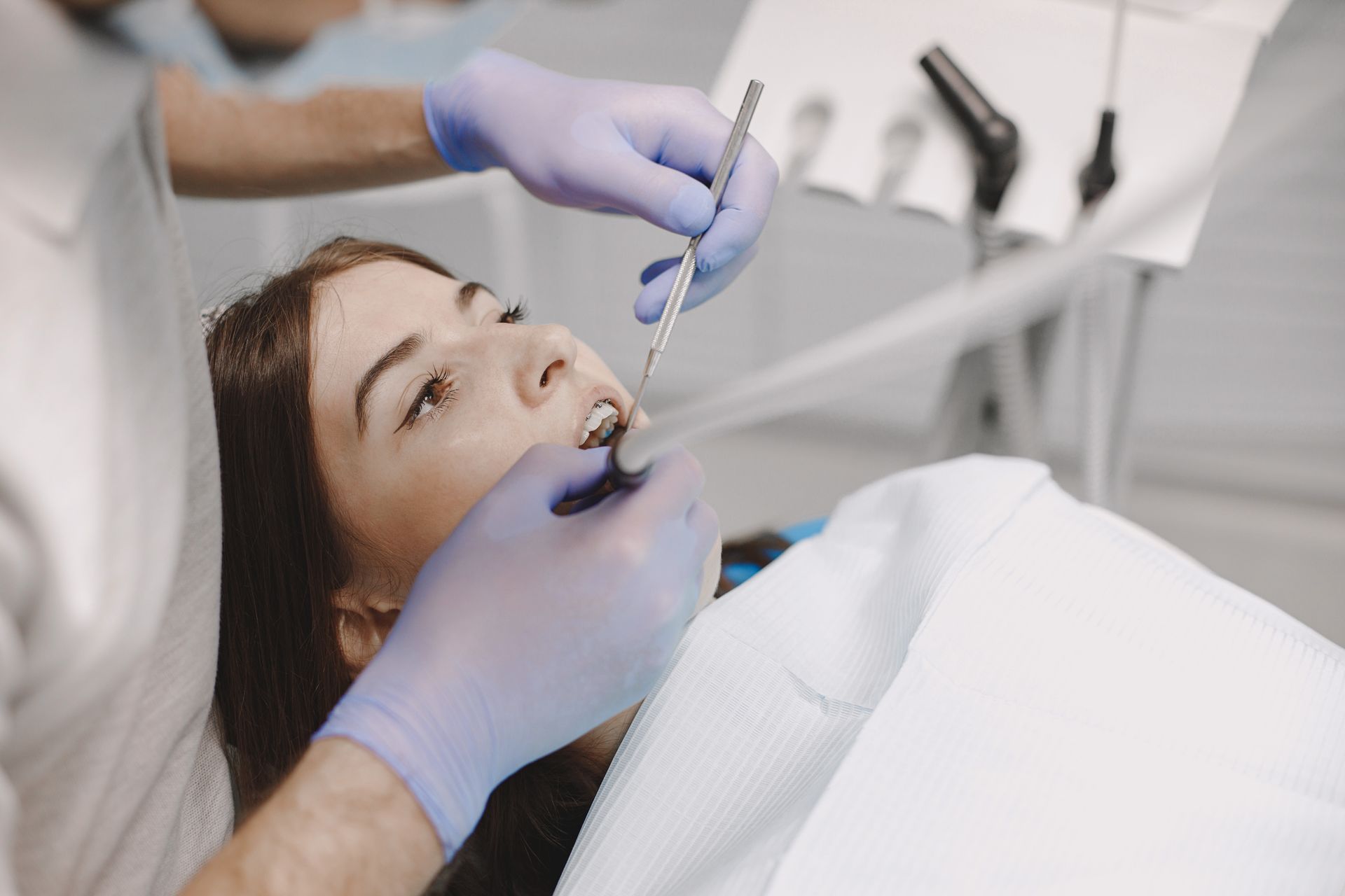 Dentist assessing oral health at Robert A. Lantzy DMD, ReCODE Dementia Protocol in Newtown, PA