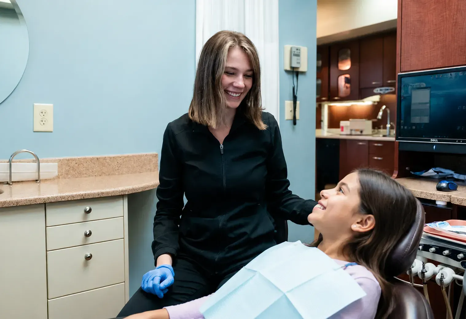 Dentist examining a child at Robert A. Lantzy DMD, Children's Dentistry in Newtown, PA