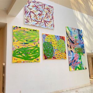 Abstract Colorful Paintings Displayed on a White Wall in a Bright Gallery Space at Robert A. Lantzy, DMD, LCC in Newtown, PA