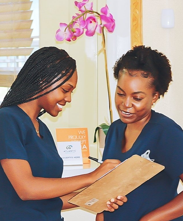 Patient Registration Team Members Jernea Thompson and Adriann McPhee