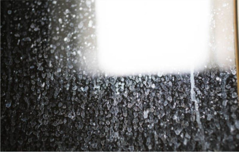 a picture of a window with waterspots