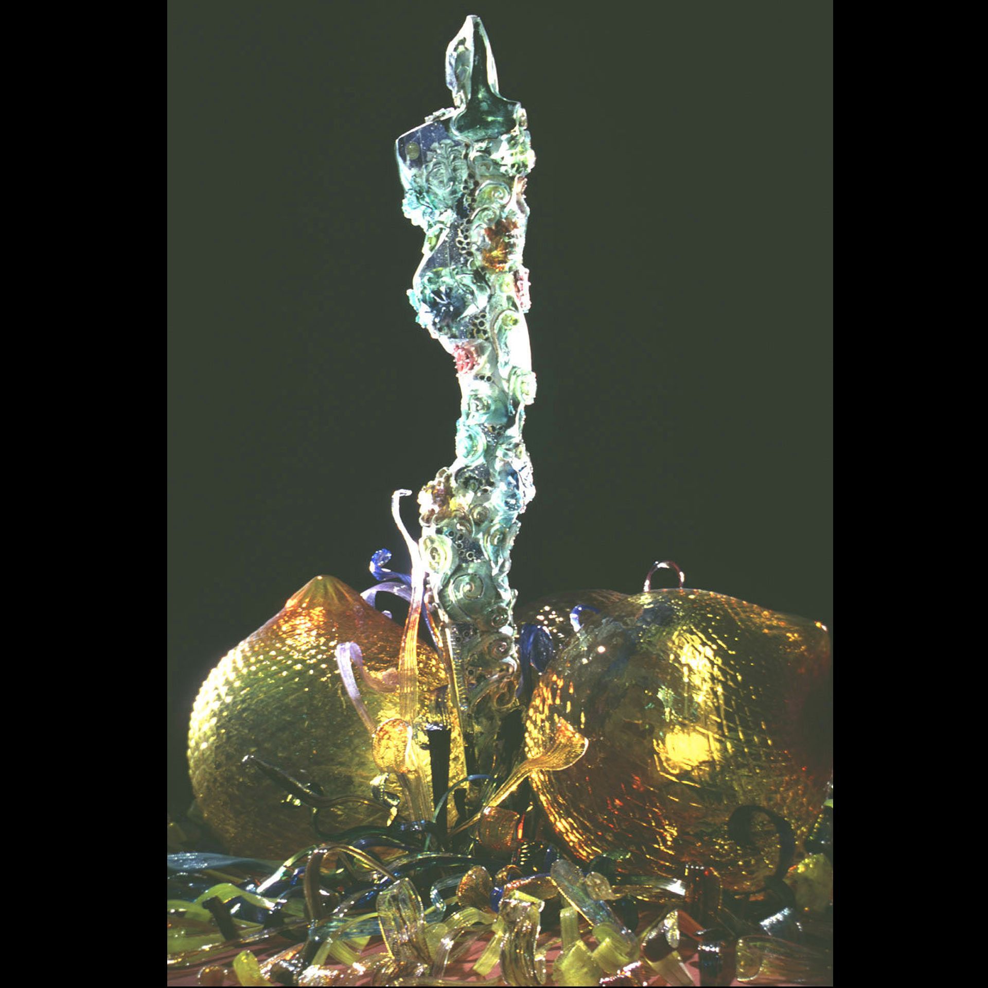 A close up of a sculpture with a black background