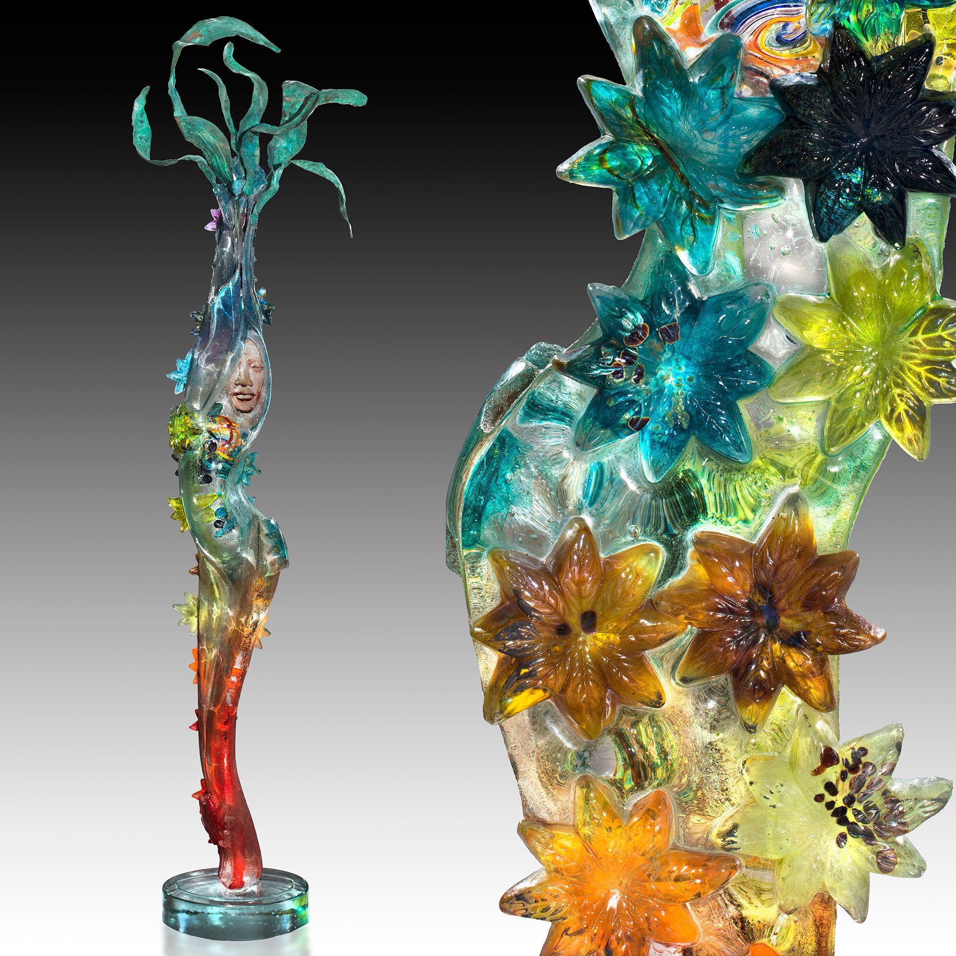 A colorful glass sculpture with flowers on it
