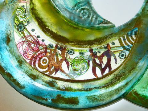 A close up of a sculpture with a swirl design on it