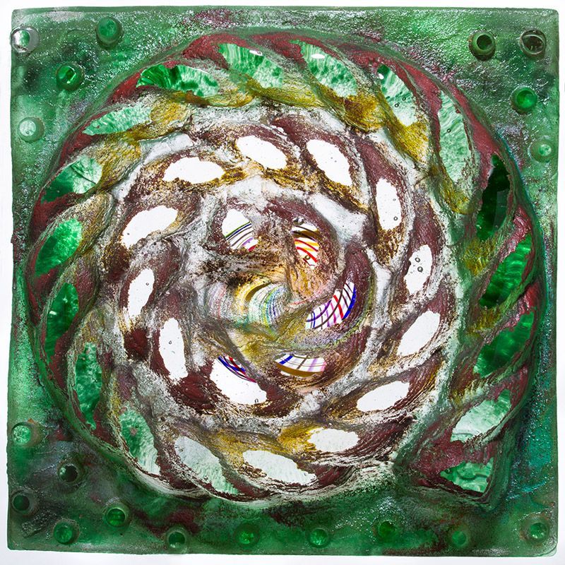 A painting of a swirl on a green background