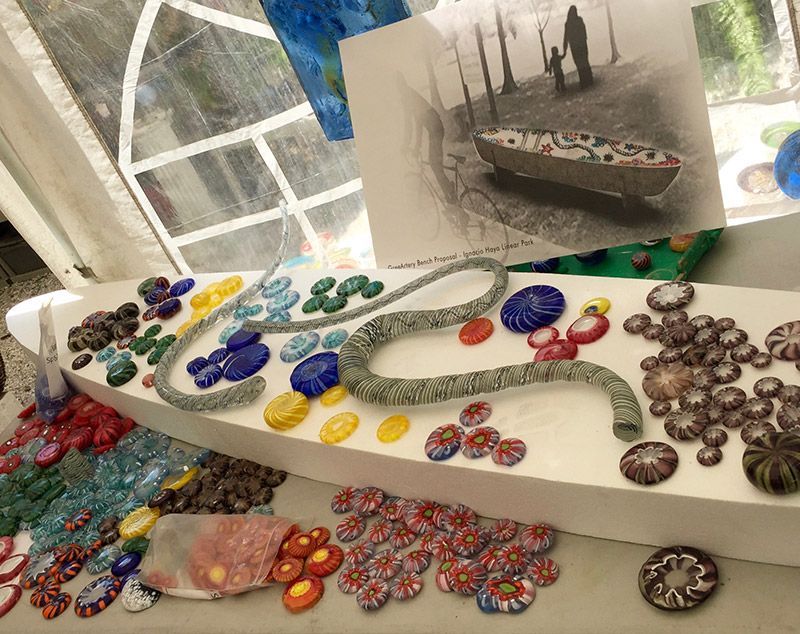 A table with a lot of buttons and a picture of a boat on it