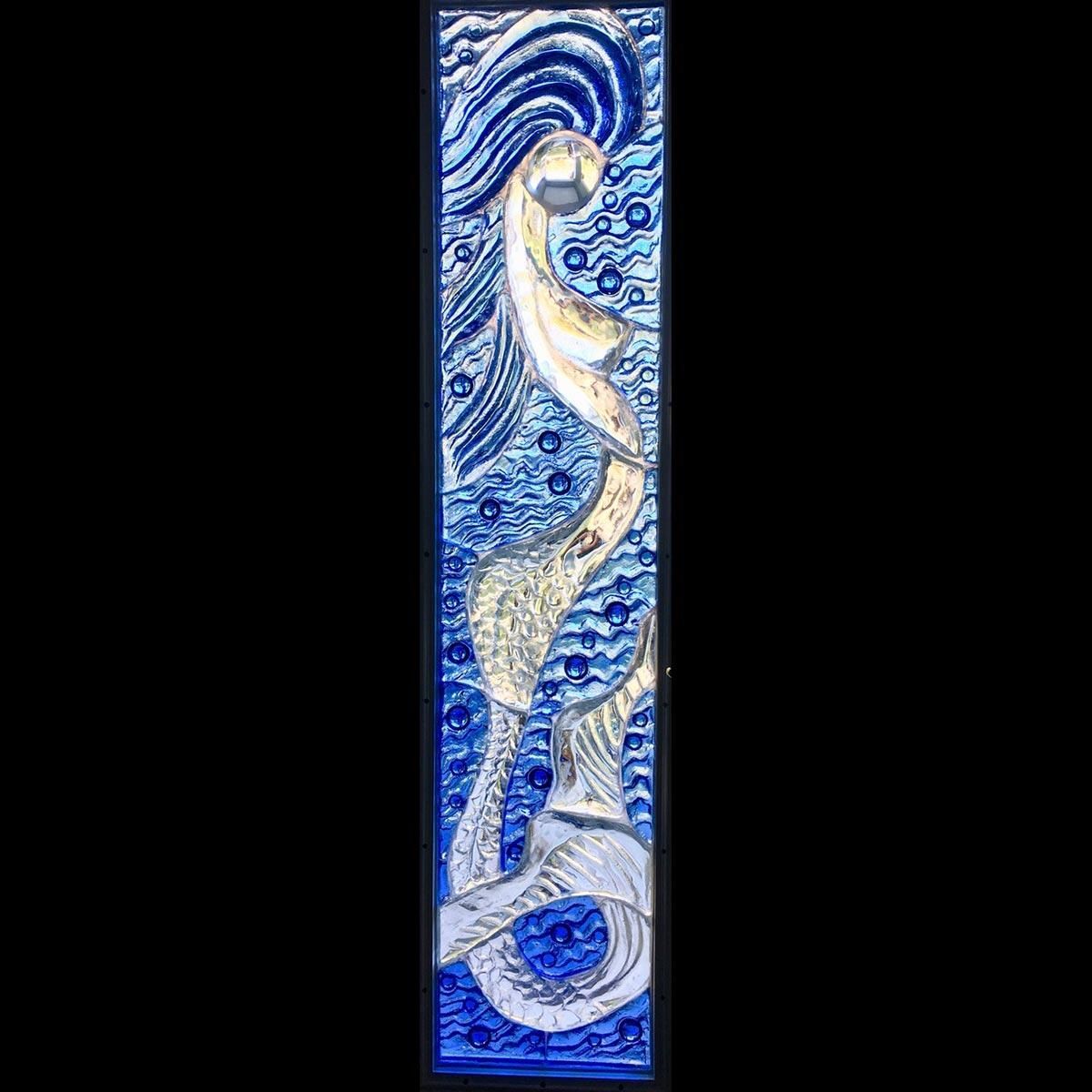 A painting of a mermaid swimming in the ocean on a black background.