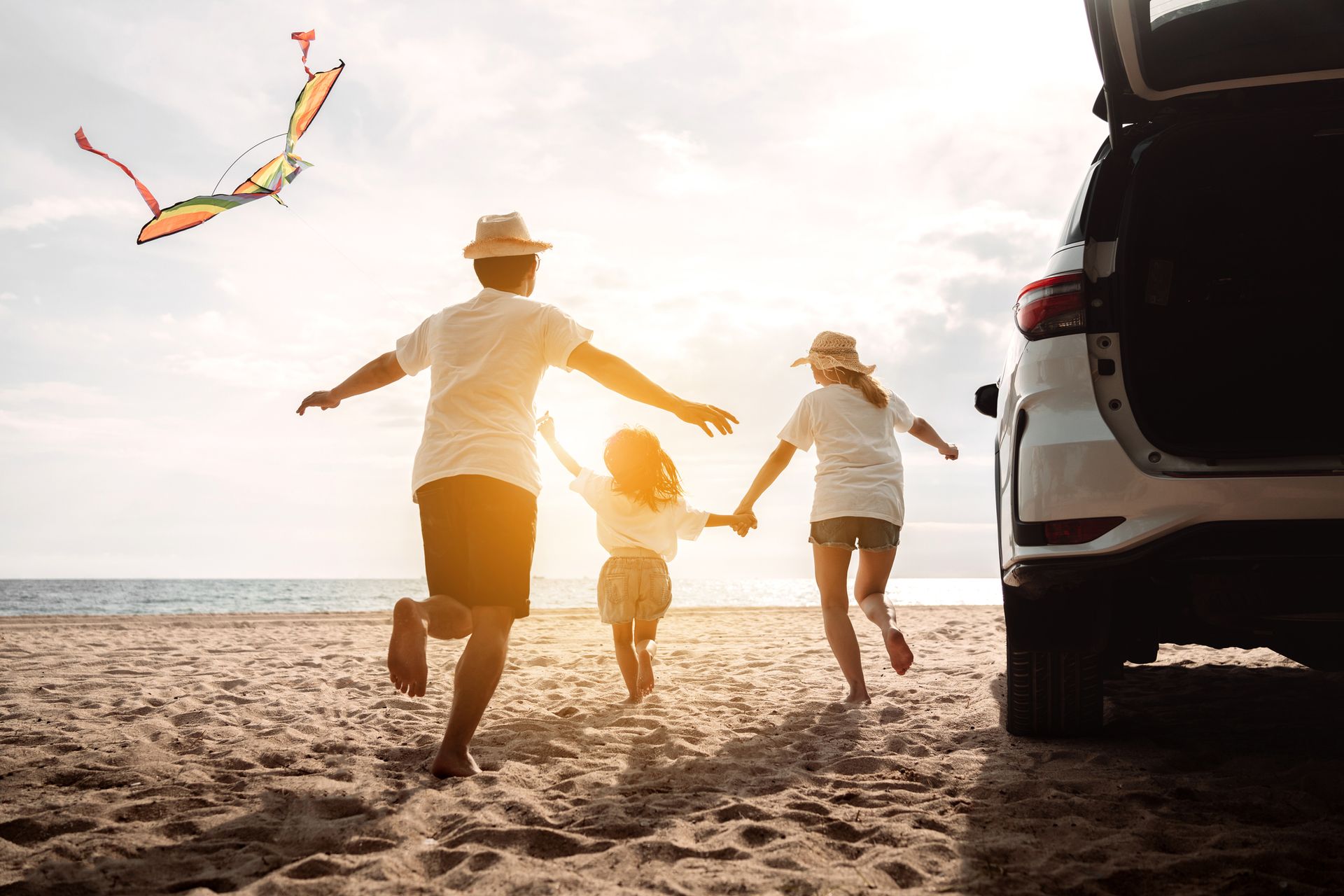 Family Playing at the Beach – Sarasota, FL – All Stat Home Health