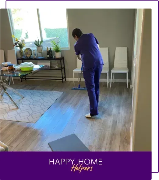 Professional Cleaner Mopping Floors in a Living Room