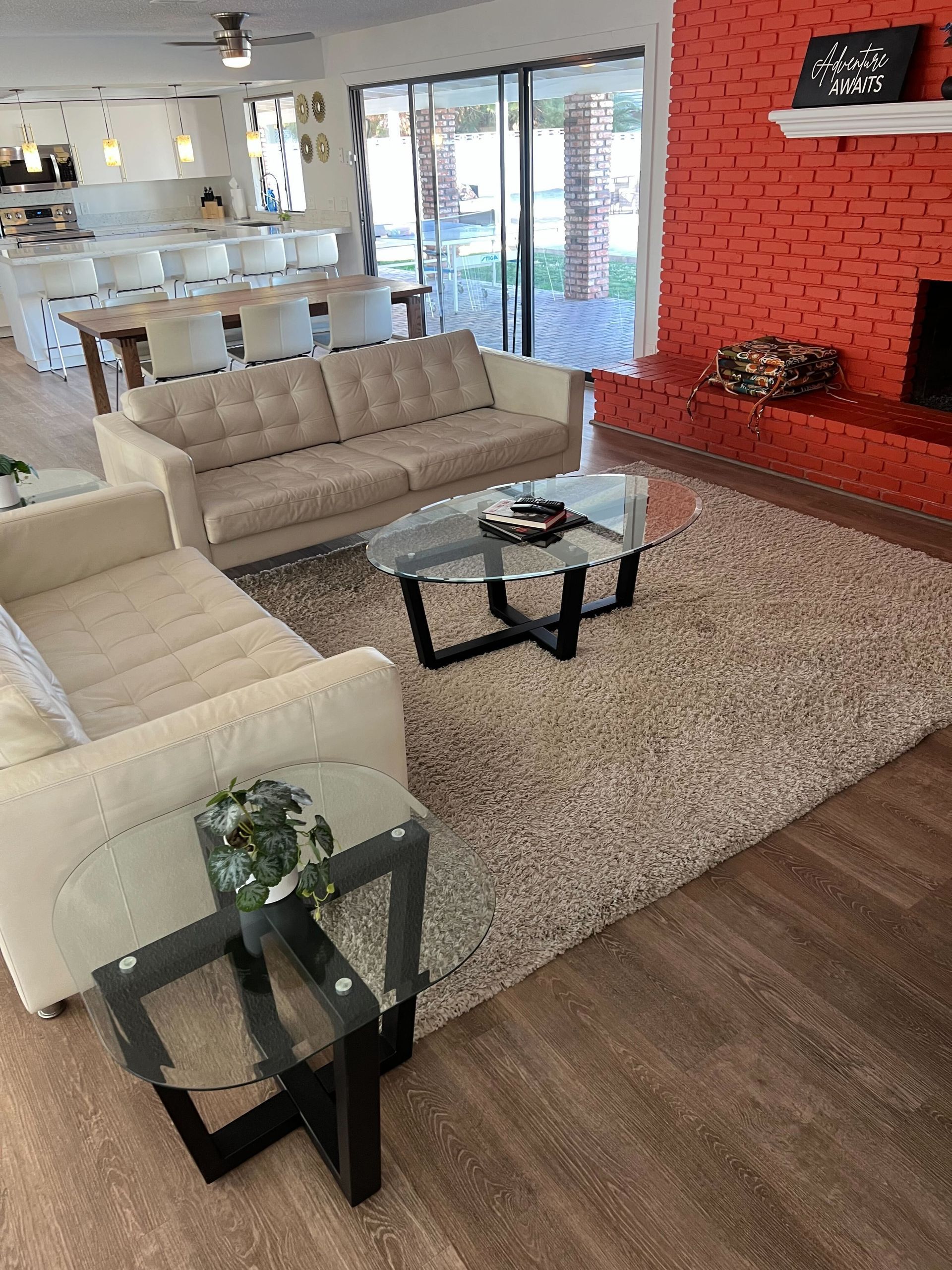 A living room with a couch and two coffee tables