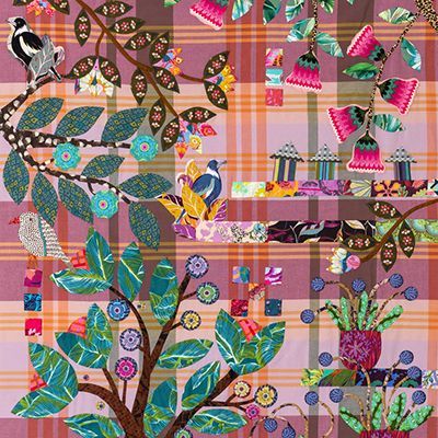 A quilt design featuring stylized birds, floral patterns, and geometric shapes against a pink plaid background.