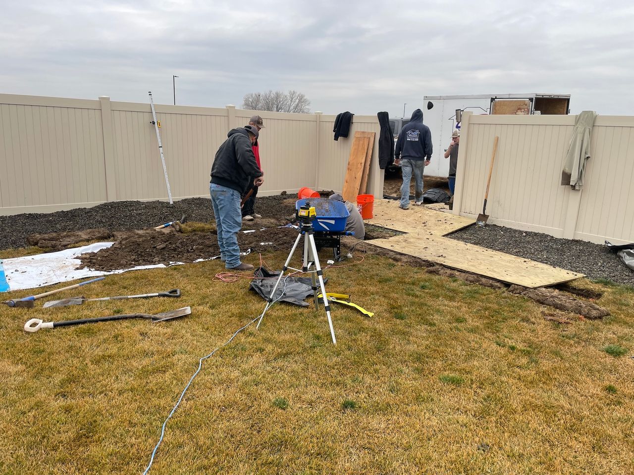 People getting ready to install a french drain