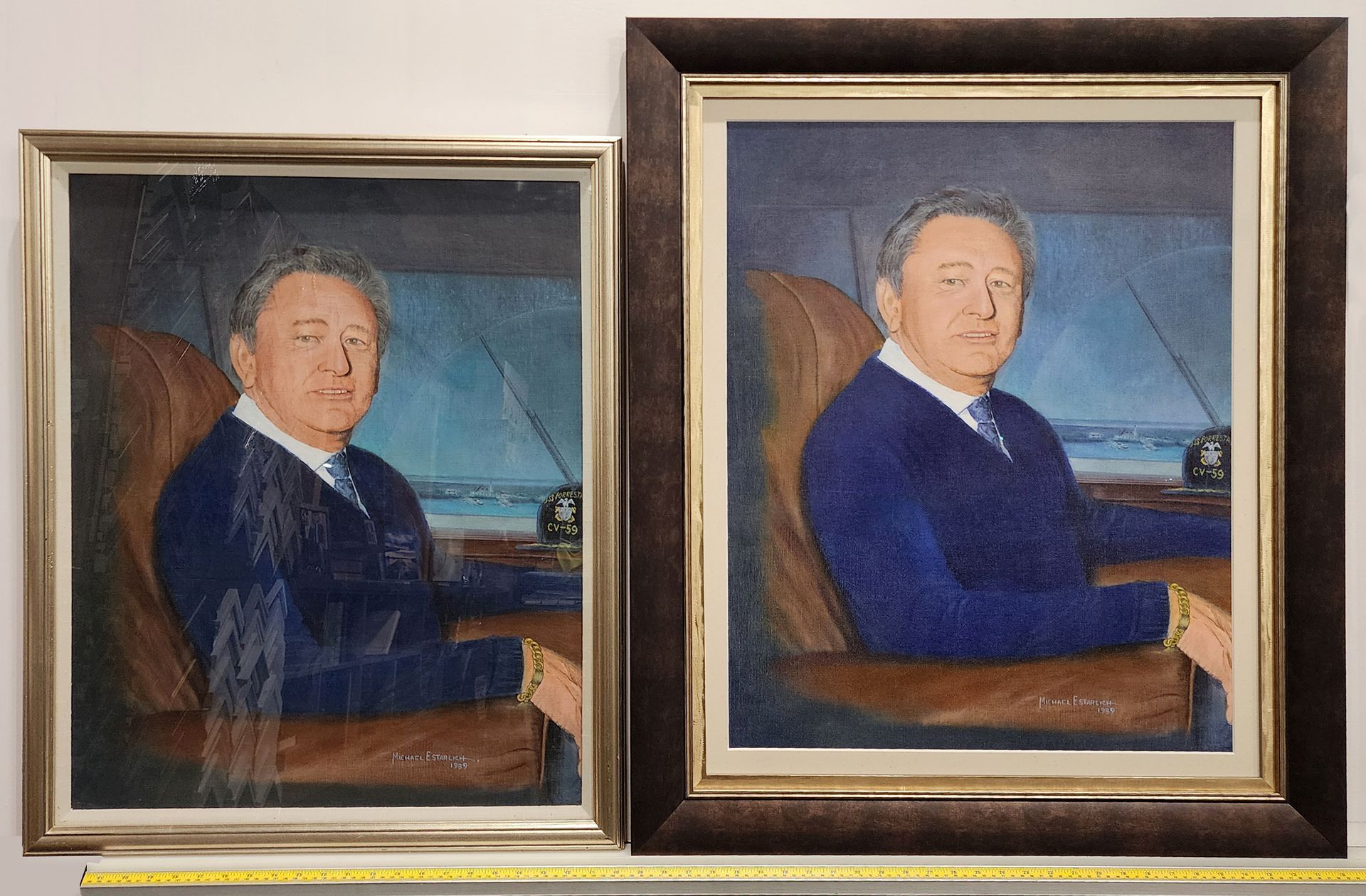 Two framed portraits of a seated man in a blue suit, shown side by side.