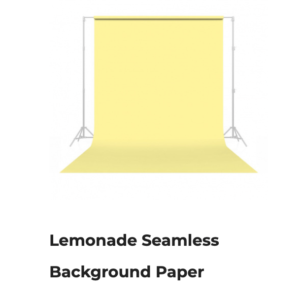 Yellow seamless background paper on stands with text label below