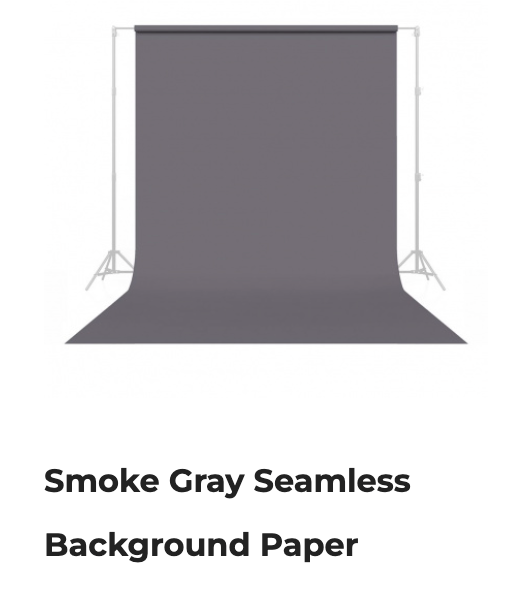 Smoke gray seamless backdrop paper roll on stands with curved floor sweep