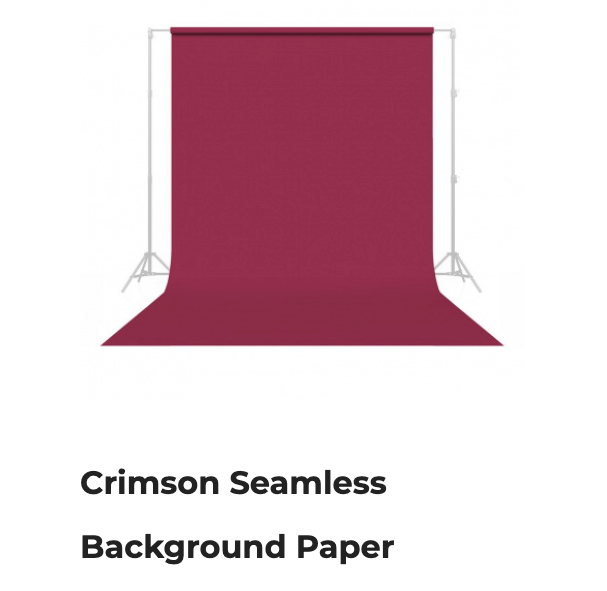 Crimson seamless background paper roll on stand