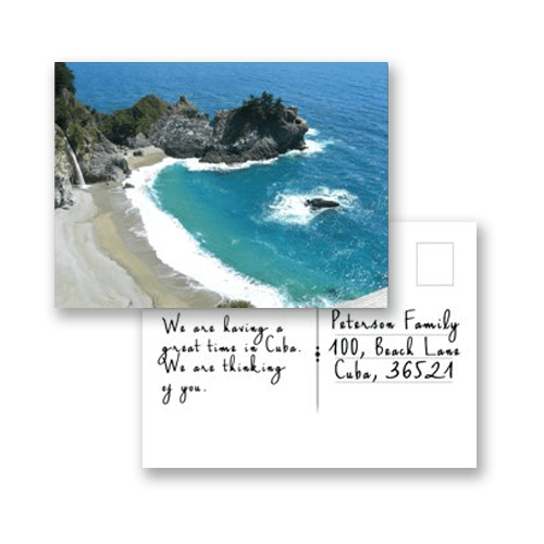 Handwritten postcard from a beach cove with a blue sea and sandy shore, addressed to the Peterson family.