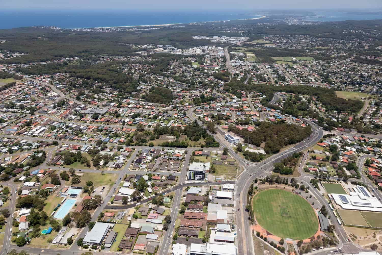 An Aerial View of a City With a Soccer Field in the Middle of It — Jim Wall Automotive in Mittagong, NSW