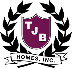 The logo for tjb homes inc. is a shield with a laurel wreath around it.