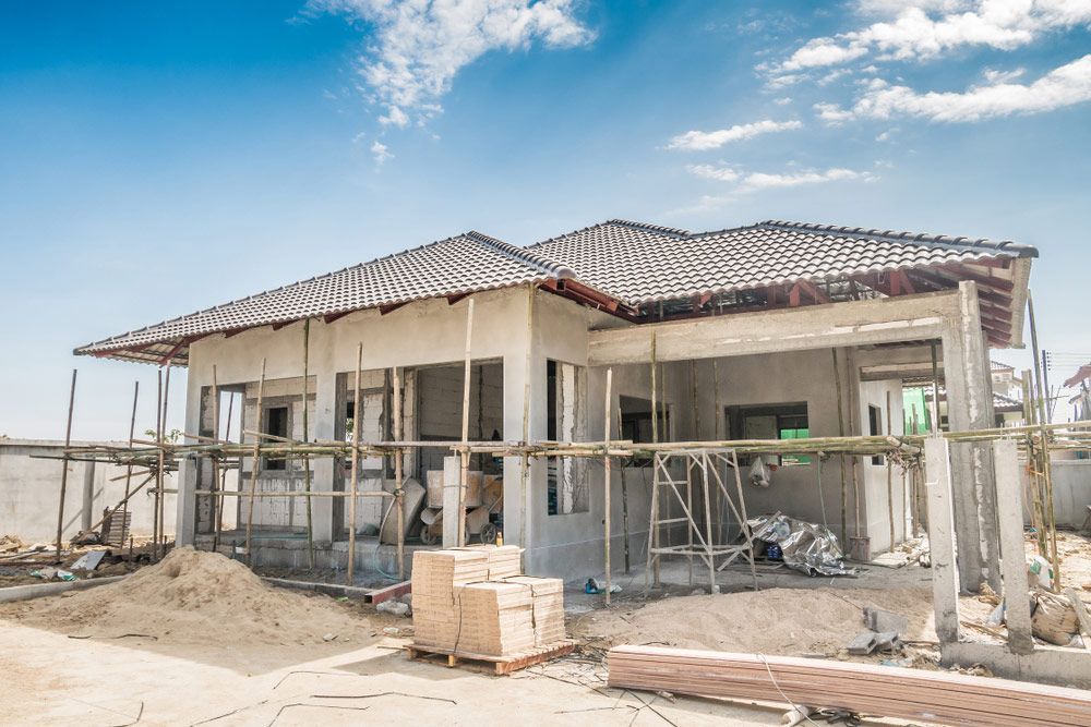 A House is Being Built in the Middle of a Dirt Field — A. Webber Building in Jervis Bay, NSW