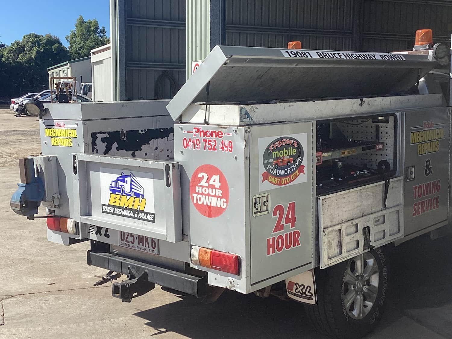 A 24 Hour Towing Truck is Parked in a Parking Lot — Bowen Mechanical & Haulage in Bowen, QLD