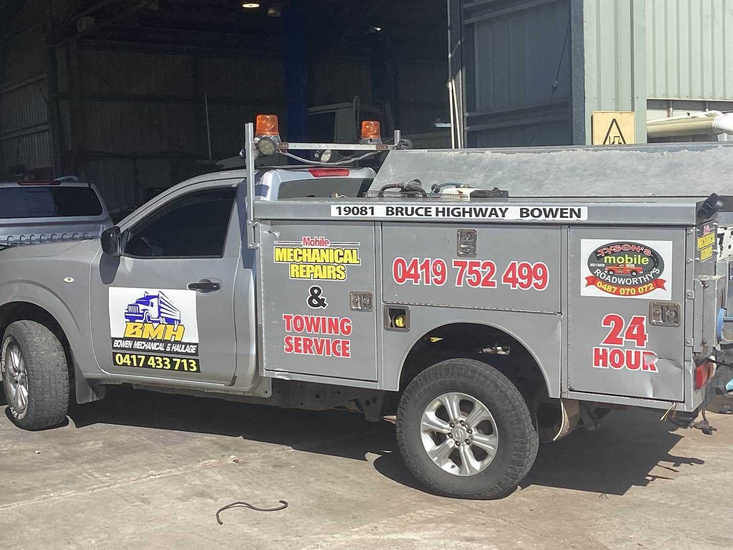 A Gray Truck is Parked in Front of a Building — Bowen Mechanical & Haulage in Bowen, QLD