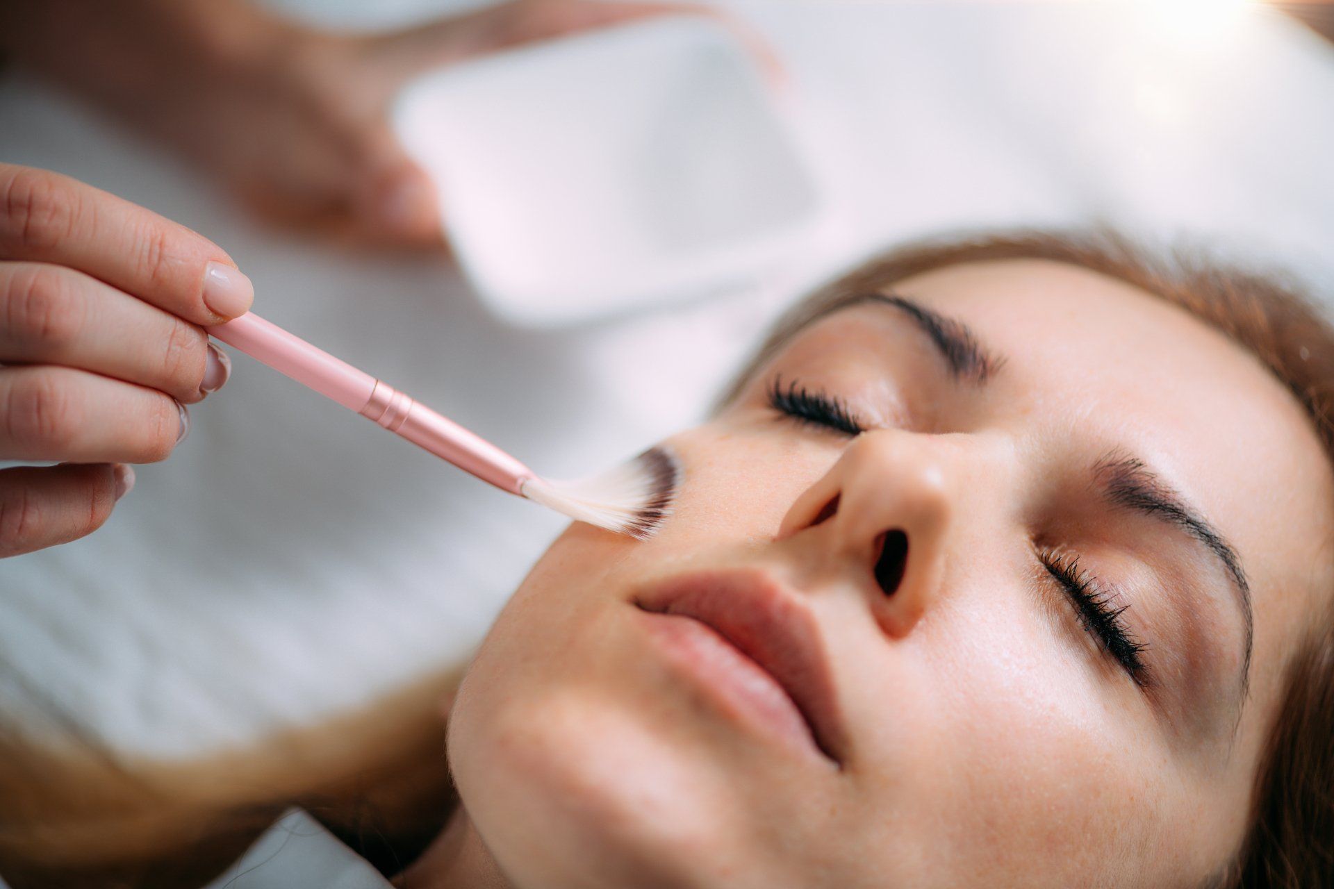 a woman getting chemical peel