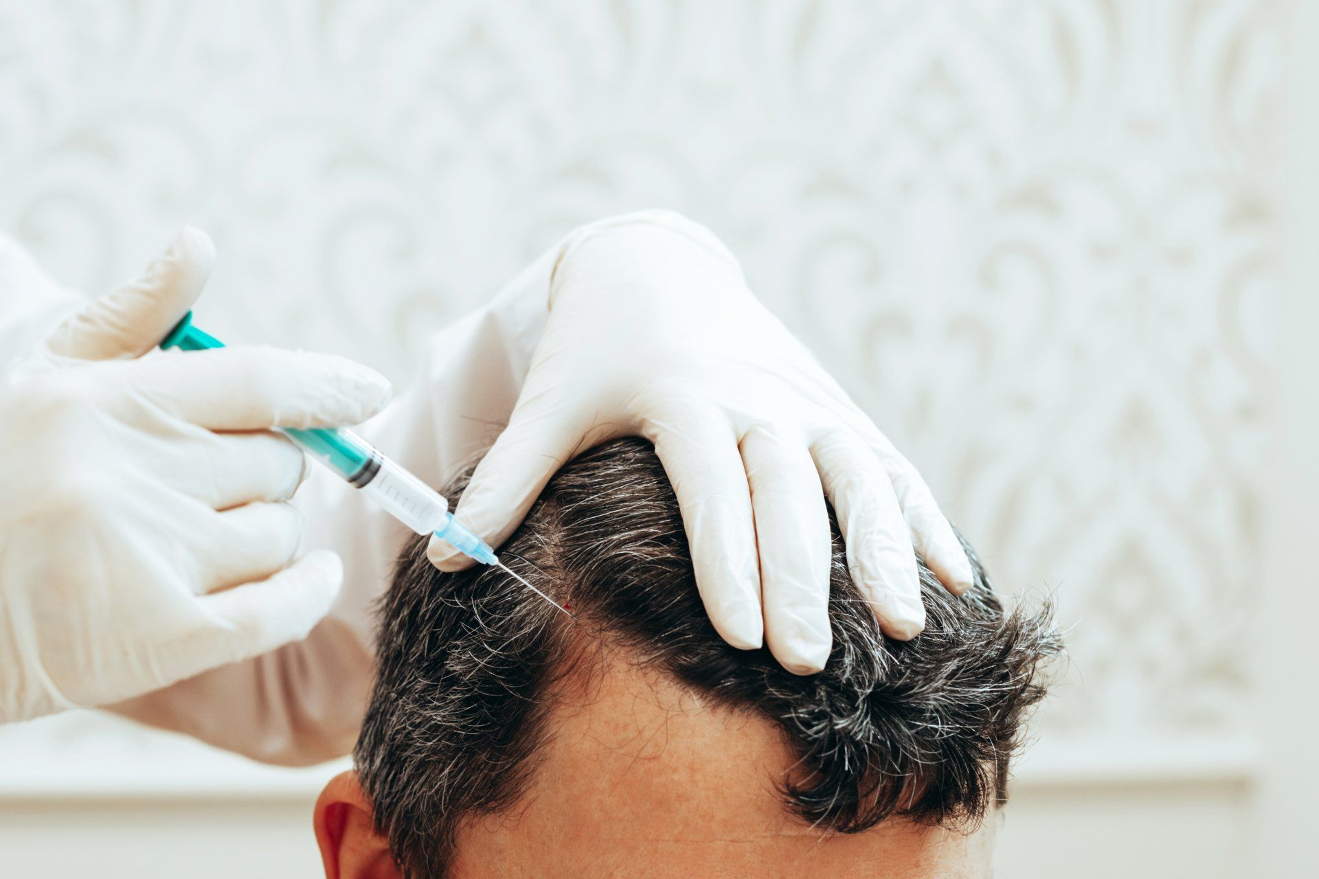 Man gets injection for hair loss