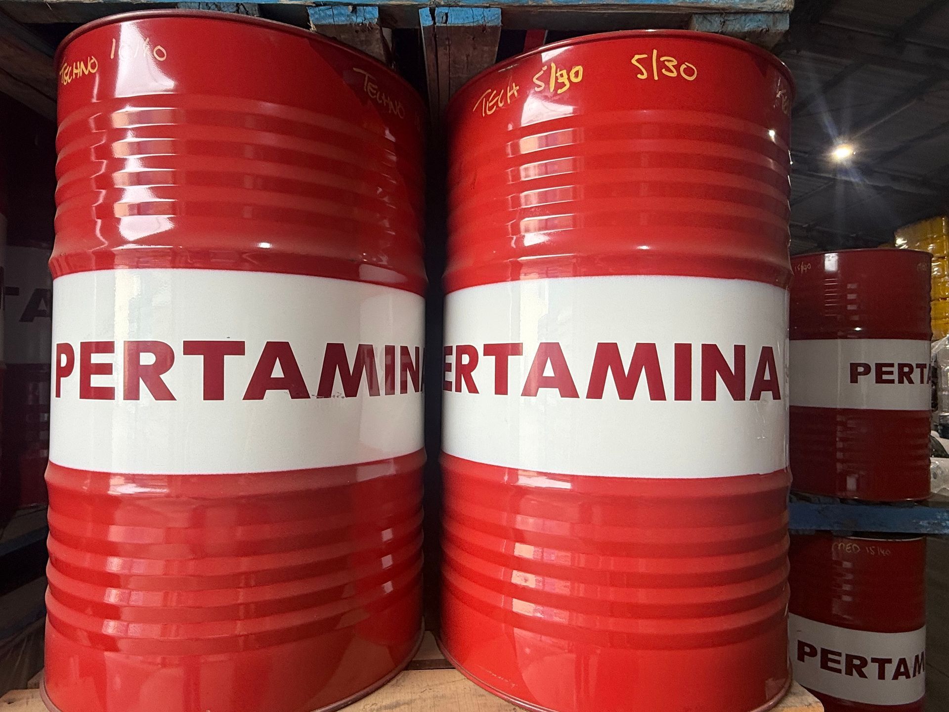 Two red Spill Kit buckets on yellow shelf — Envirokleen Solutions In Slade Point, QLD