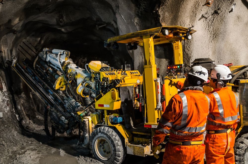 Mining Truck Driving Along A Mountain — PBC Compliancing in Mackay, QLD