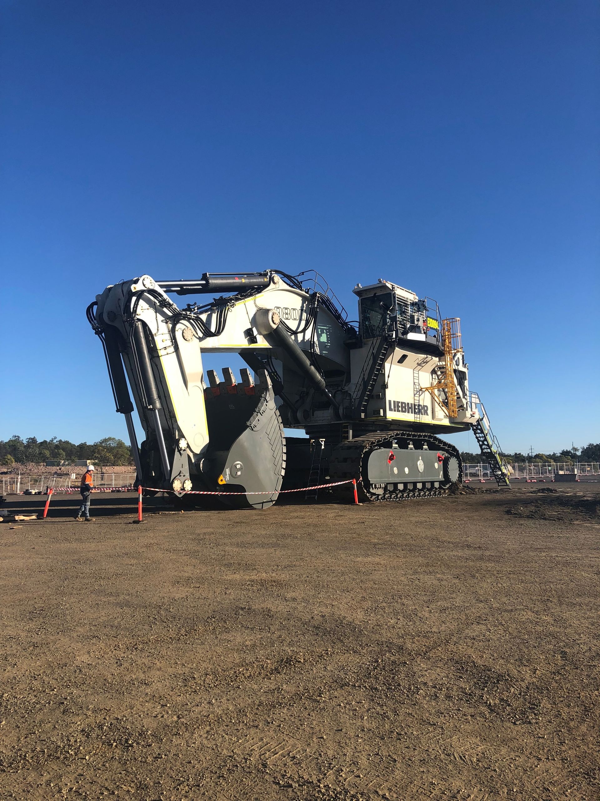 Large white digger with blue sky behind it - PPB Compliancing Fleet Compliance Moranbah