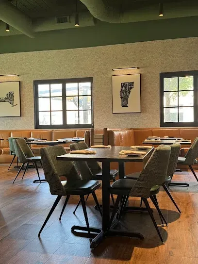 AT Electric LLC - ensures top-quality electrical solutions for restaurants like American Revelry, providing efficient lighting and power systems.