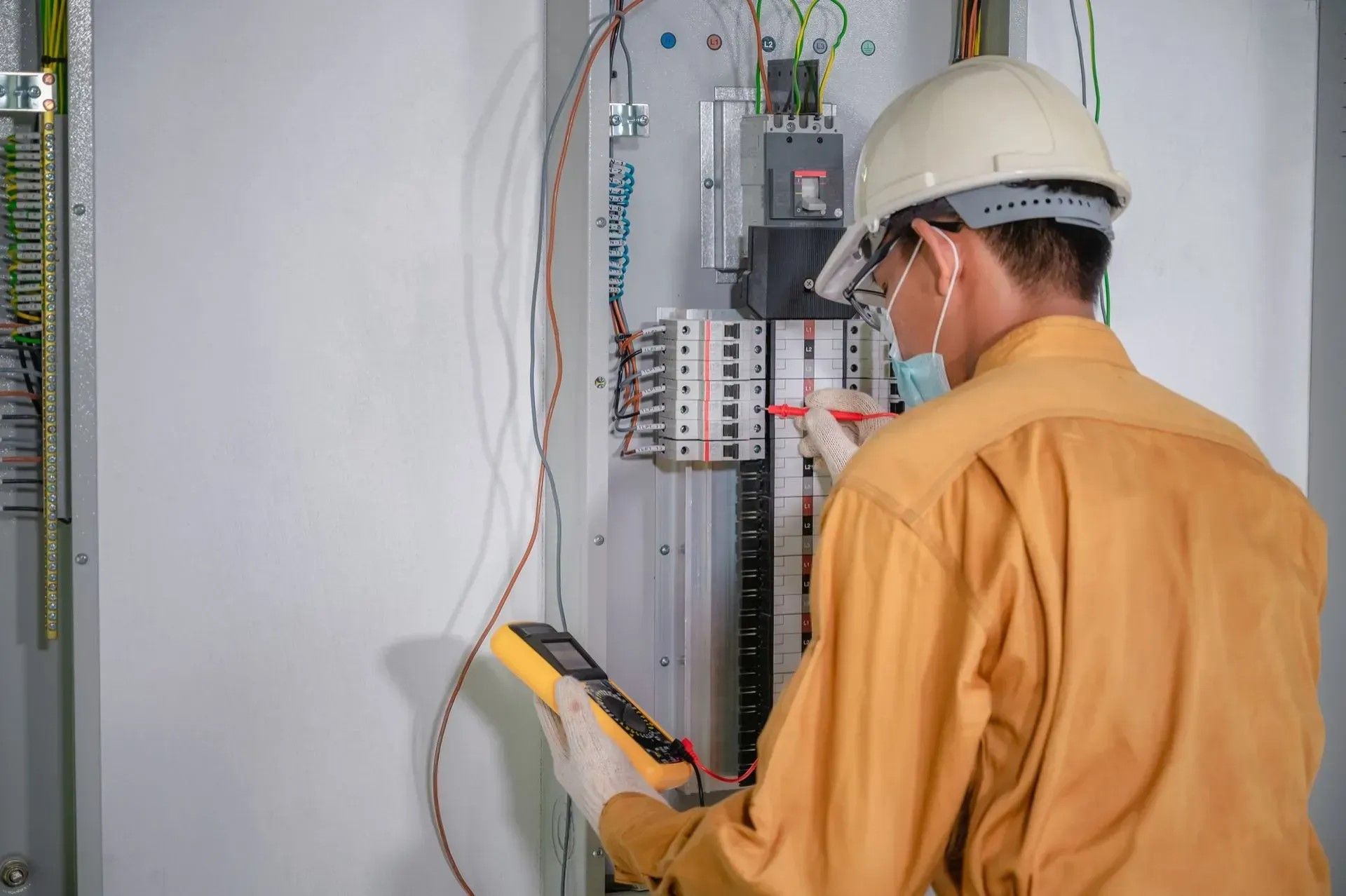 Certified Electrician Performing Electrical Panel Upgrade