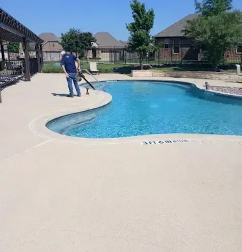 Local Electricians – Local electricians are shown working by a residential swimming pool, ensuring all outdoor electrical components meet safety standards and operate efficiently