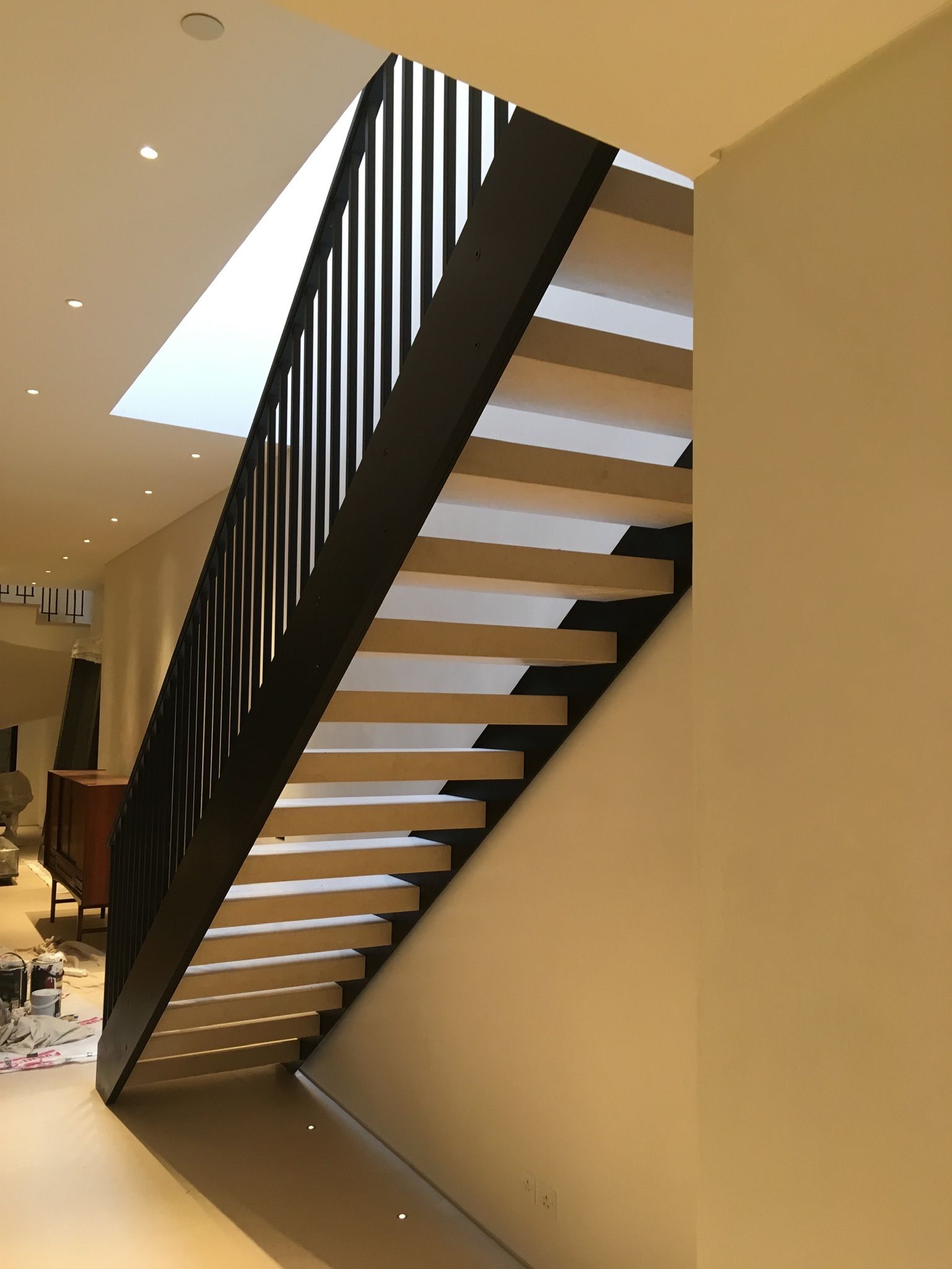 Bespoke black metal staircase installation in London