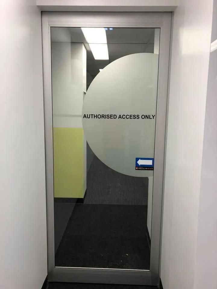 A Door with A Sign on It that Says Authorized Access Only — Solarmaster in Murarrie, QLD