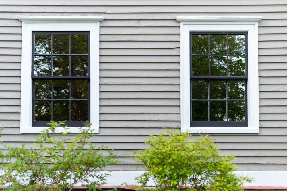 A residential home with tinted windows.