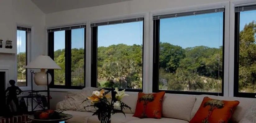 A Living Room with A Couch and Lots of Windows — Solarmaster in Gold Coast, QLD