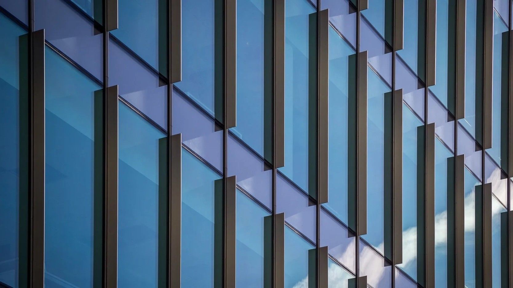 A Close up Of a Tall Building with A Lot of Windows — Solarmaster in Murarrie, QLD