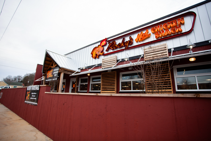 A restaurant with a sign that says chicken shack