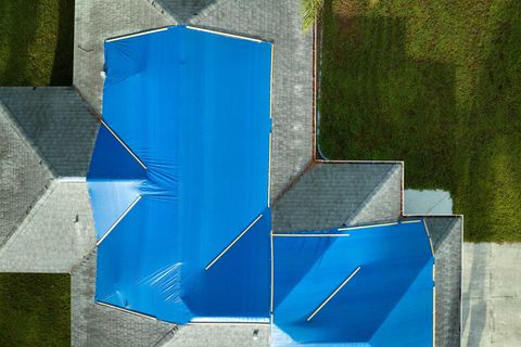 emergency roof service. tarped roof