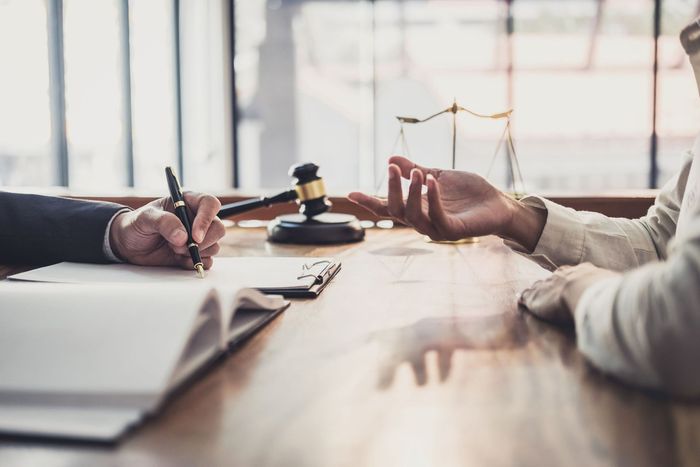 male lawyer judge consult having team