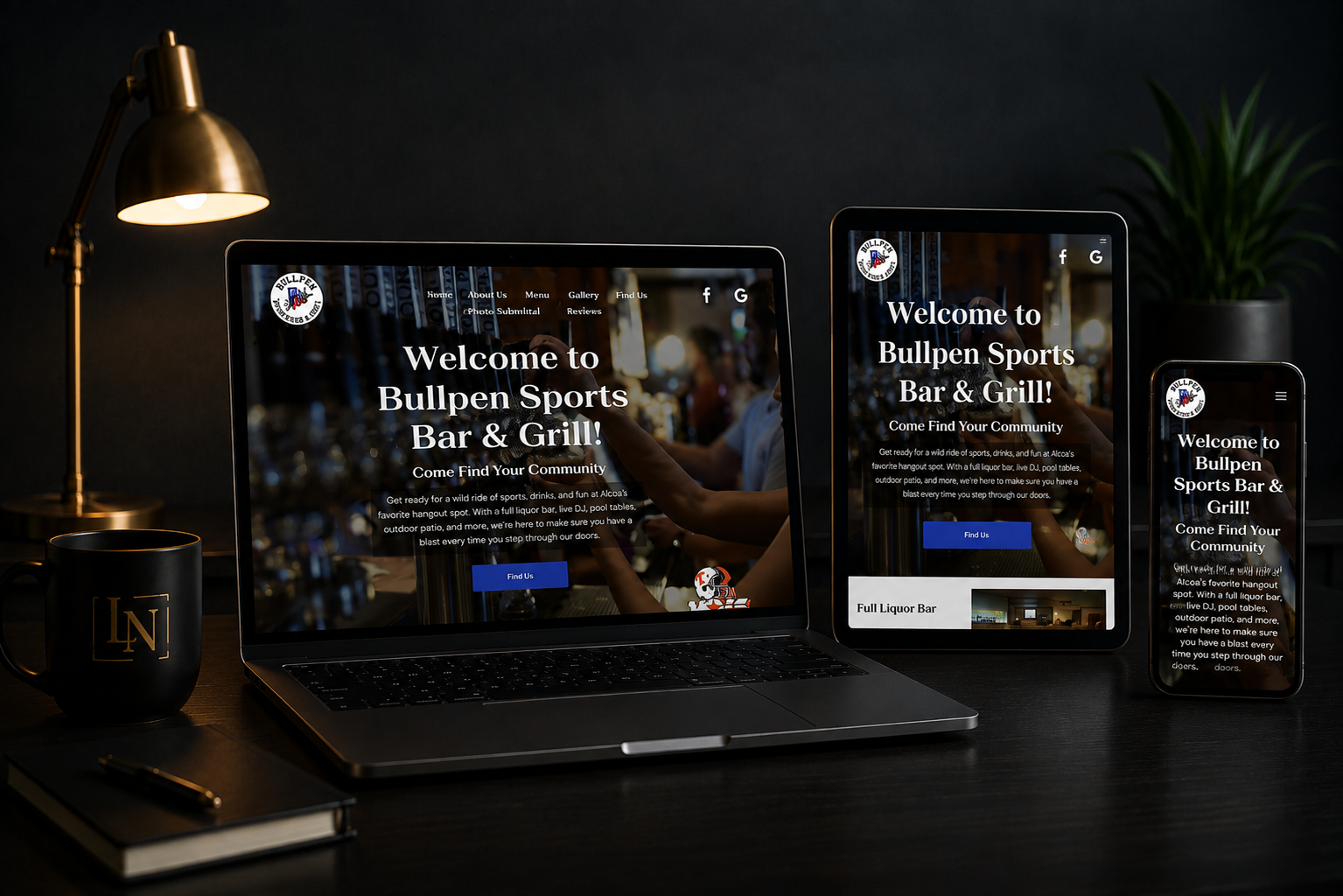 Desk setup with laptop, tablet, phone, and coffee mug showing a dark website landing page.