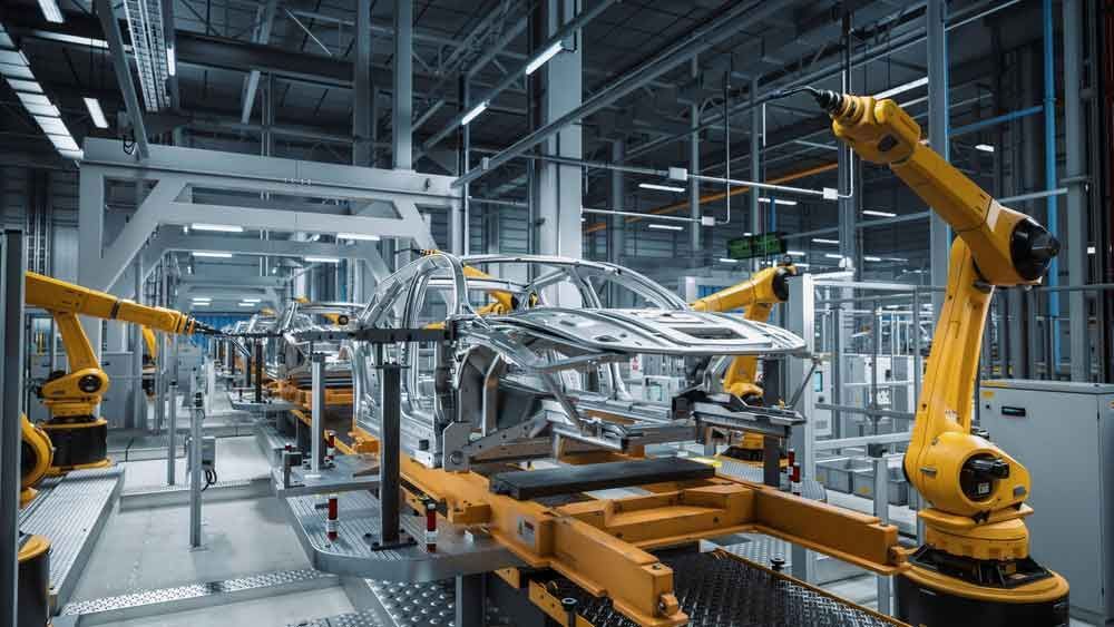 Yellow Automation Machine Working On A Car — Industrial Automation Australia in Eagle Farm, QLD