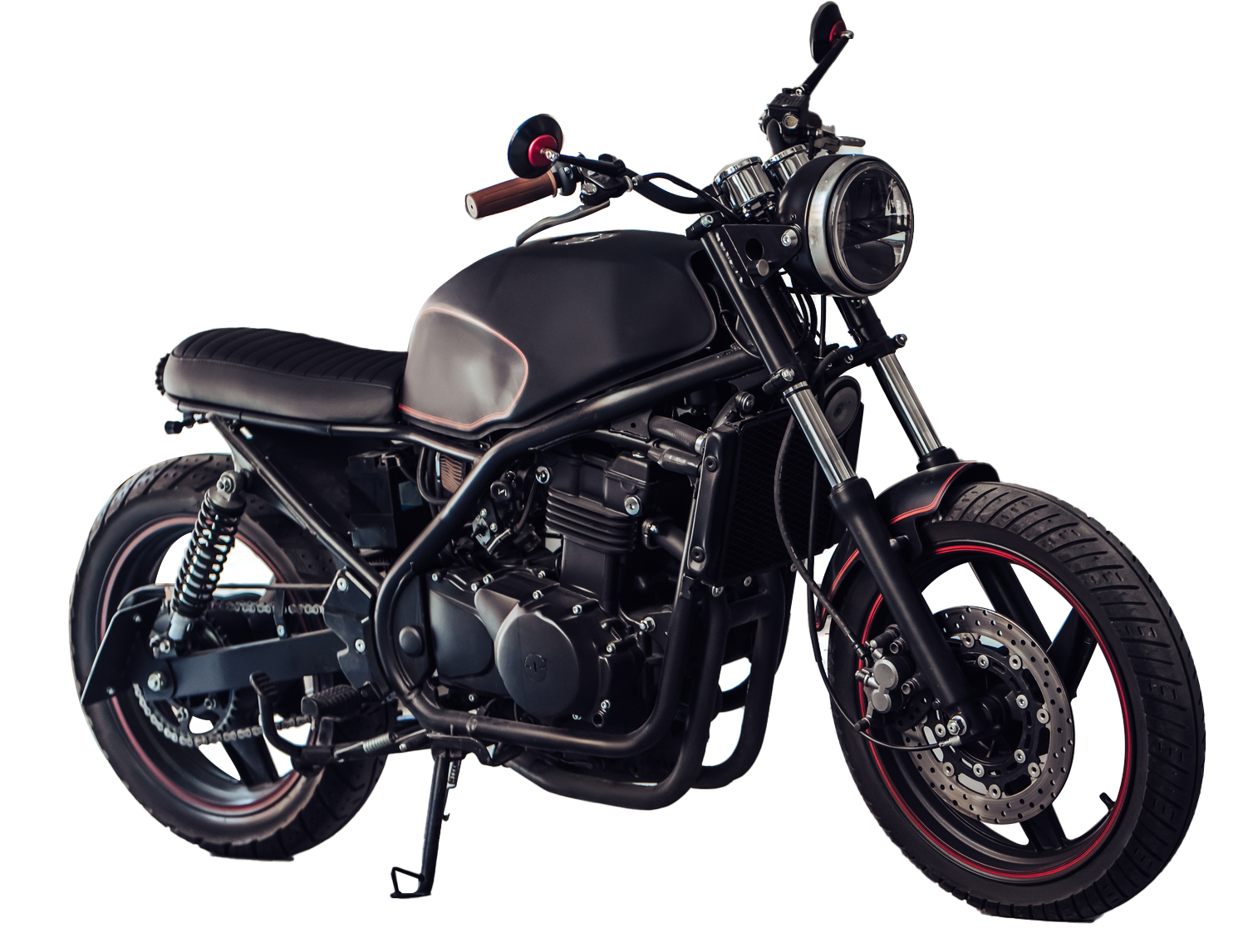 A black and white motorcycle is parked on a white background.