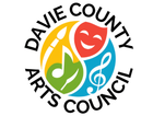 Davie County Arts Council logo with brush, musical note, mask, and treble clef within a circular design.