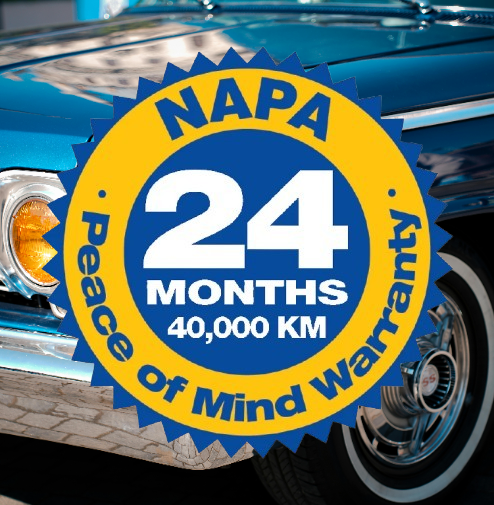NAPA 24-month, 40,000 km peace-of-mind warranty badge on a blue car front.