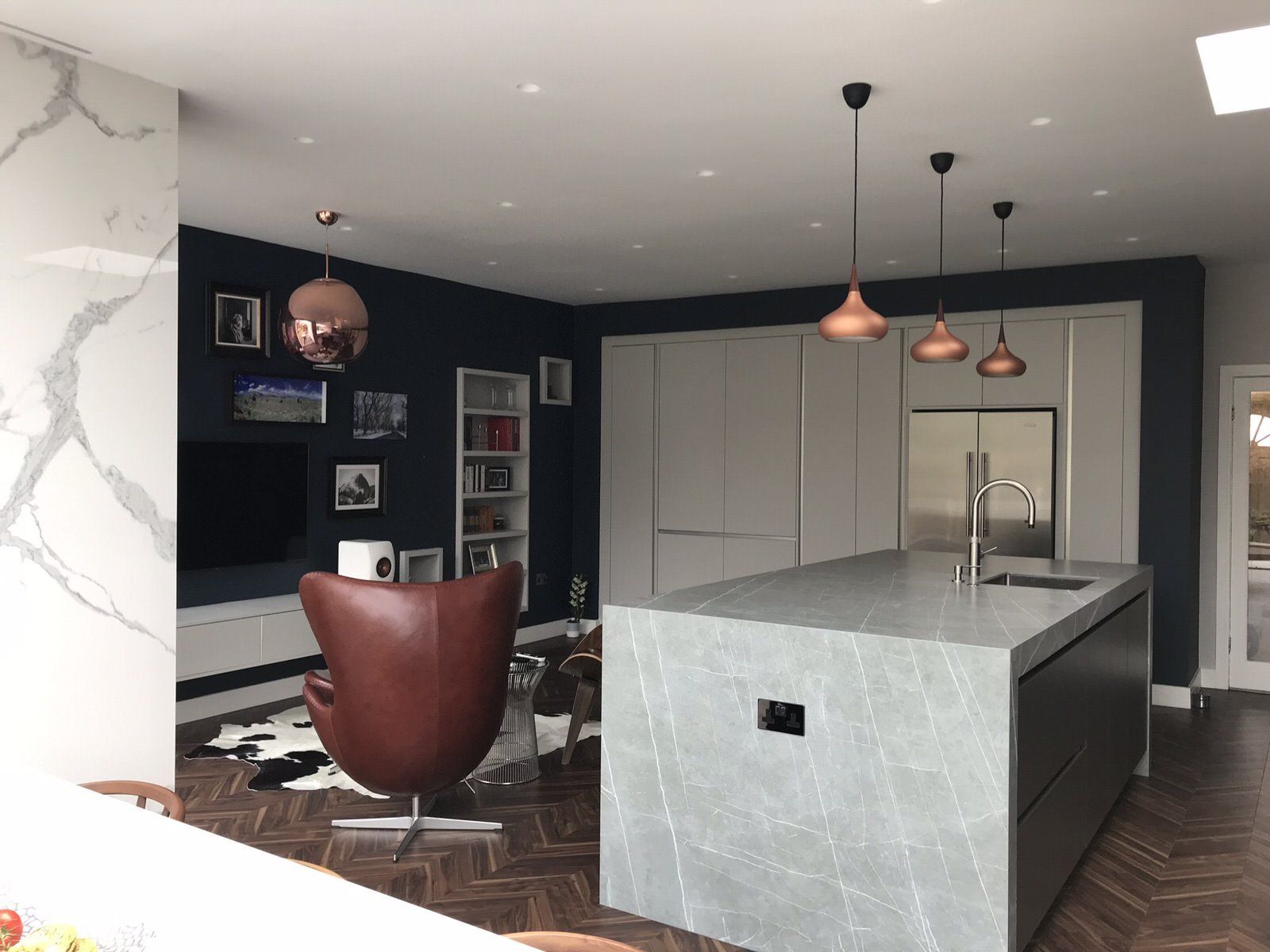 Interior view of a large kitchen extension with modern layout and underfloor heating in a Greater Manchester home