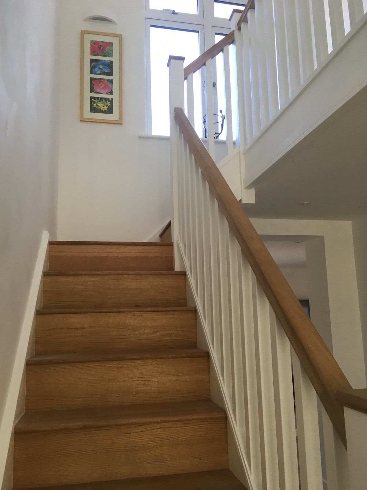Modern staircase in refurbished Cheshire bungalow, completed by Rawlinson Construction