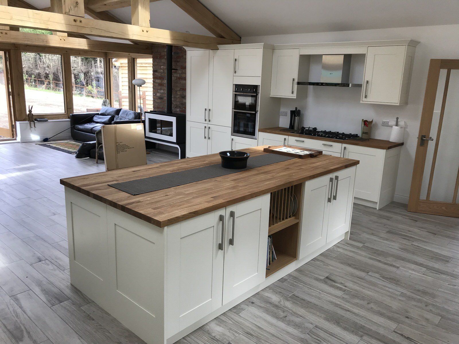 Light-filled kitchen with oak beams in extended and renovated Cheshire home